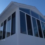 custom sun room with tall windows for great views