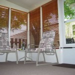 sun room with wall to wall carpeting and patio furniture
