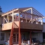 Machose Contracting team installing the skeleton of a home addition project
